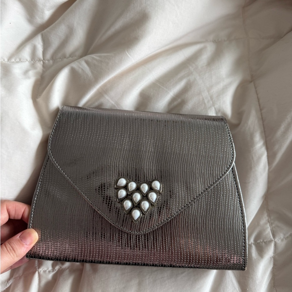 Elegant Silver Clutch with Pearl Accents
